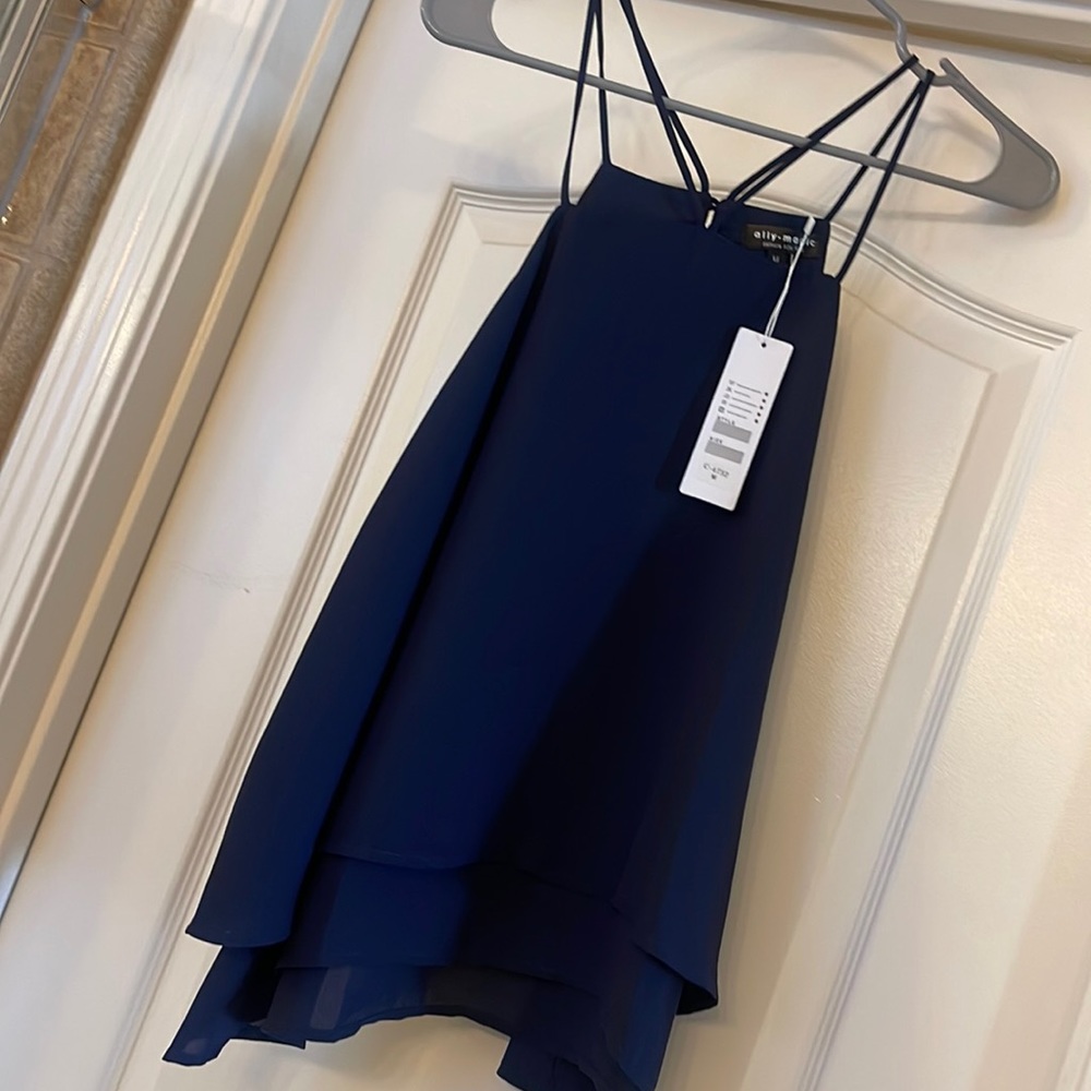 New with tags me at blue flowy tank top